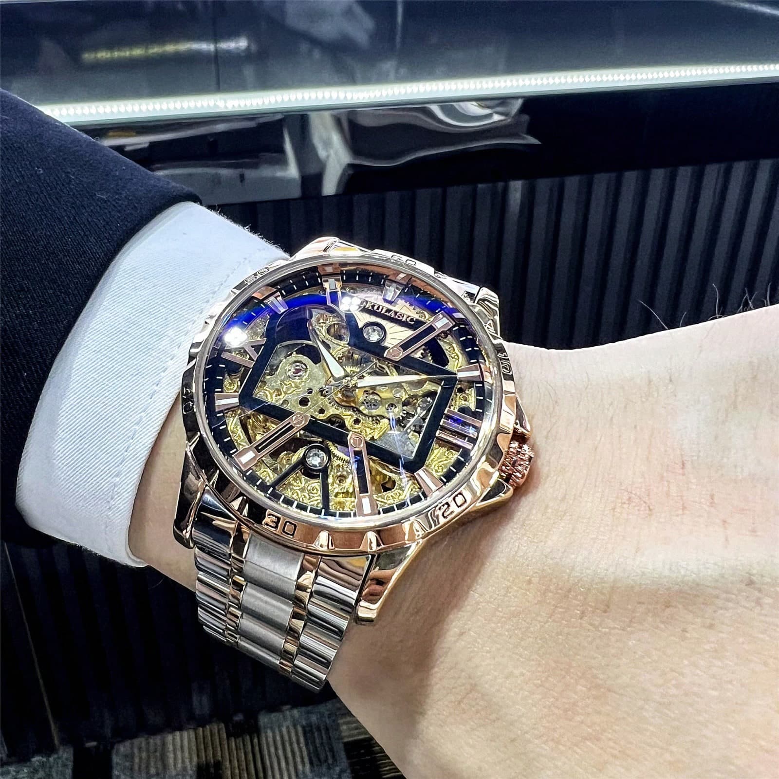 1 pièce Montre mécanique automatique de luxe pour hommes avec cadran évidé, ton or rose, aiguilles lumineuses et bracelet en acier inoxydable,